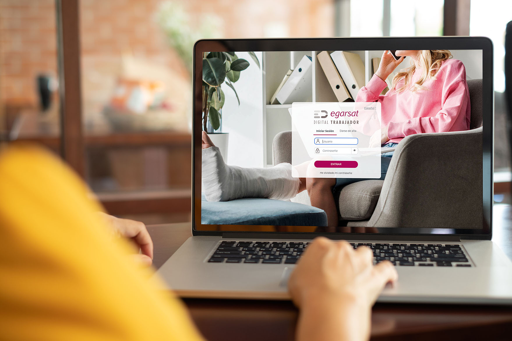 Mockup image of woman using and typing laptop computer with blank white desktop screen working at home.
